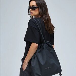 Thirty Years Convertible Black Drawstring Tote Backpack